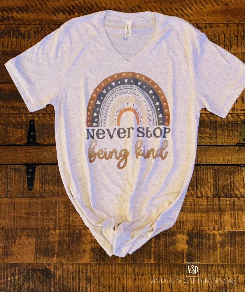 Never Stop Being Kind Graphic Tee Apparel